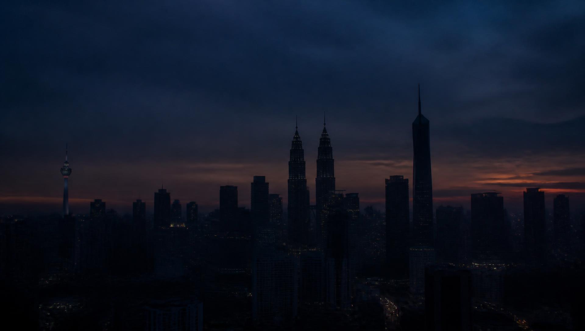 Kuala Lumpur skyline at dusk with the Petronas Twin Towers and Merdeka 118
